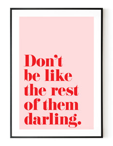 A portrait ‘don’t be like the rest of them darling’, typographic giclée print on white paper in a black frame, using pink and red ink.