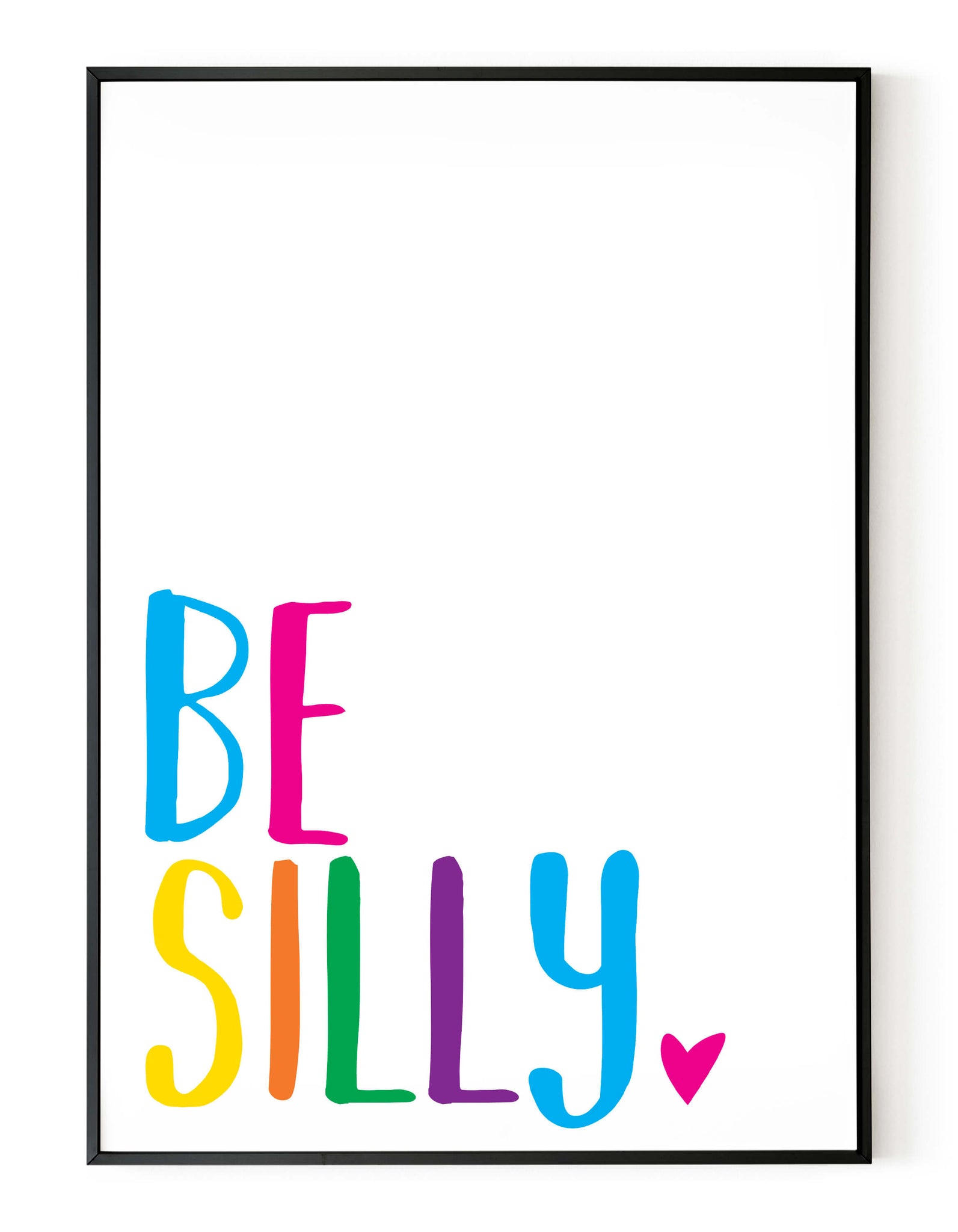 A portrait giclée print with ‘be silly’ message, on white paper in a black frame, using bold bright colours.