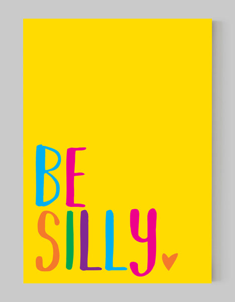 A portrait giclée print with ‘be silly’ message, on white paper, using bold bright colours on a yellow background.