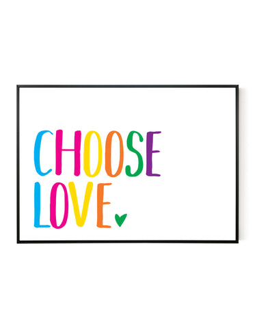 A landscape giclée print with ‘Choose Love’ message, on white paper in a black frame, using bold bright colours.