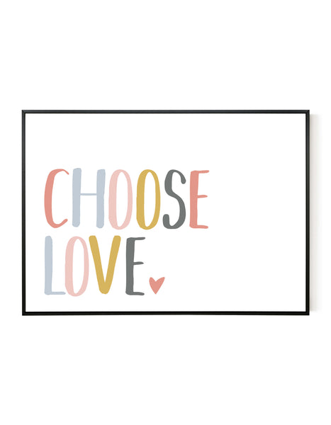 A landscape giclée print with ‘Choose Love’ message, on white paper in a black frame, using peachy pastel shades.