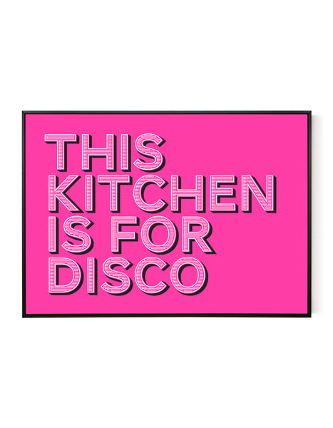 A landscape ‘this kitchen is for disco’ giclée print, on white paper in a black frame, using bold magenta ink.