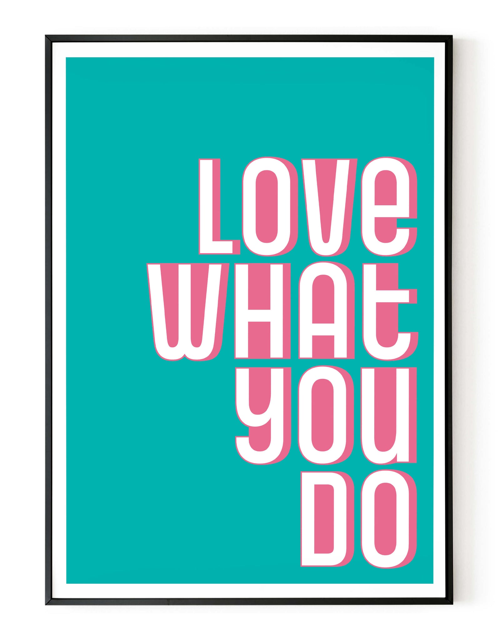A portrait ‘love what you do’ giclée print on white paper in a black frame, using teal and pink ink.