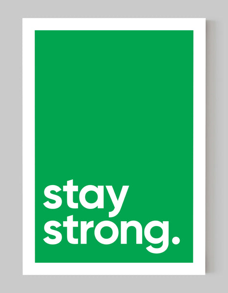 A portrait ‘stay strong’ giclée print, on white paper, using a green ink..
