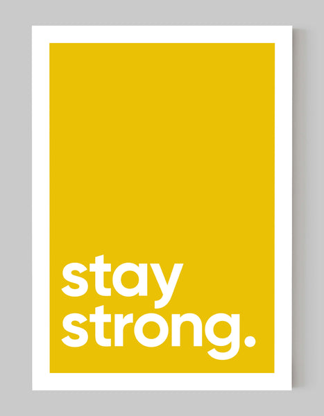A portrait ‘stay strong’ giclée print, on white paper, using a yellow ink..