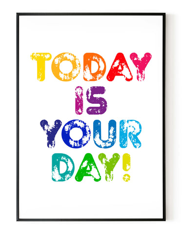 A portrait ‘today is your day’ giclée print, on white paper in a black frame, using bright rainbow coloured inks.