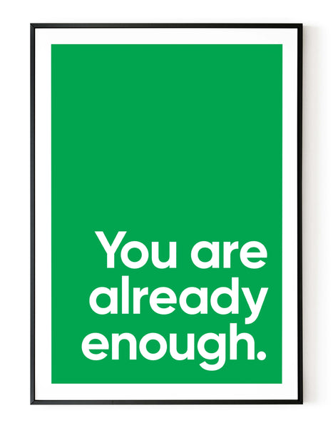 A portrait ‘you are already enough’ giclée print, on white paper in a black frame, using a green ink.