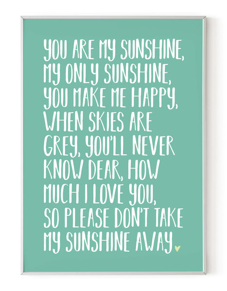A portrait ‘you are my sunshine’ lyrics giclée print, on white paper in a white frame, using aqua ink.