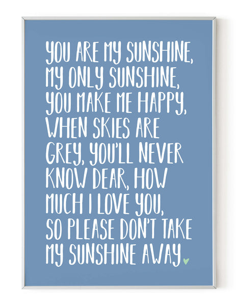 A portrait ‘you are my sunshine’ lyrics giclée print, on white paper in a white frame, using pastel blue ink.