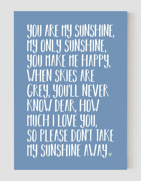 A portrait ‘you are my sunshine’ lyrics giclée print, on white paper, using pastel blue ink.