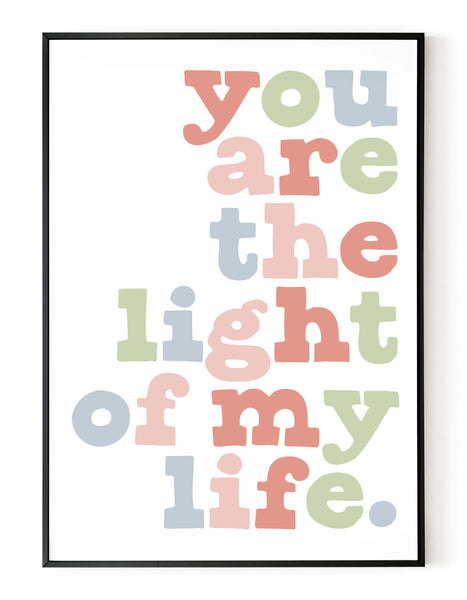 A portrait ‘you are the light of my life’ giclée print, on white paper in a black frame, using earthy inks.