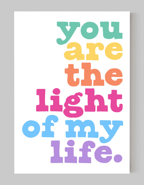 A portrait ‘you are the light of my life’ giclée print, on white paper, using pastel rainbow inks.
