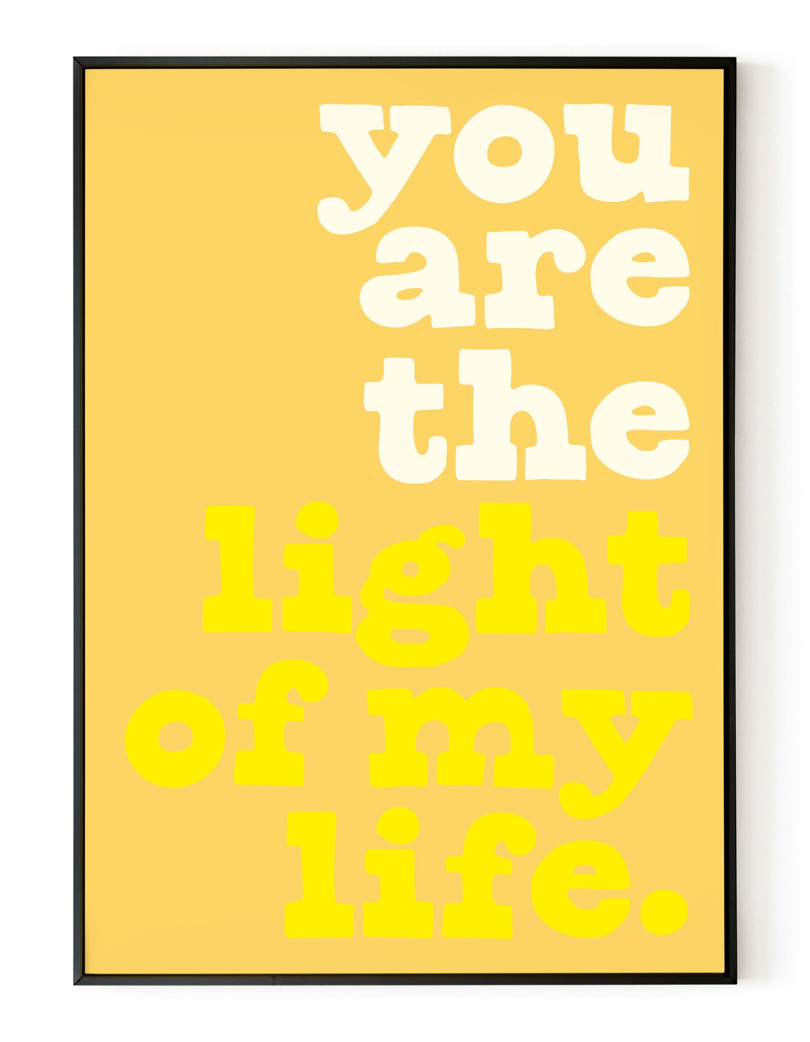 A portrait ‘you are the light of my life’ giclée print, on white paper in a black frame, using yellow ink.